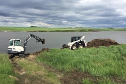 Unbothered by cloudy skies, volunteers keep Terex compact equipment humming as restoration work continues. Photo: Terex