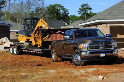 Trucks and trailers are a landscaper’s go-to couple, but the new trend is opting for customized truck beds. Photo: Hard Working Trucks