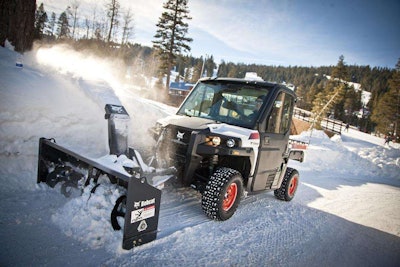 The snow-blowing attachment is available only for the Bobcat 3650 utility vehicle and features a rotating chute so you can direct the snow in whatever direction you choose. Photo: Bobcat