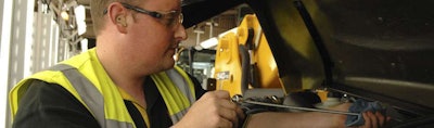 A technician works on JCB equipment at one of the company’s factories. The new program is for technicians working at JCB dealers throughout North America. Photo: JCB