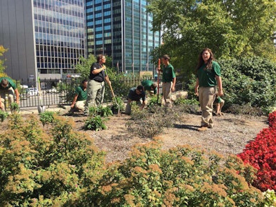 Volunteers from Knox County Career Center Landscape Design and Management Program, work on the pollinator garden with supervision from Karen Wise, KOB vice president and business leader for Davey Resource Group, a division of The Davey Tree Expert Company. Photo: Keep Ohio Beautiful