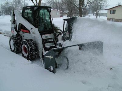 This Loftness snow blower is attached to a Bobcat S300 compact skid steer. Photo: Loftness Manufacturing