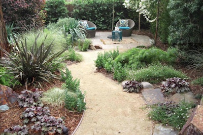 A winding path makes the space seem larger. Photo: Ketti Kupper