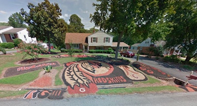 Gillespie has been mulching his lawn since 2009 with Redskins logos. Photo: Google Maps