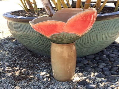 These custom-made porcelain urinals are just one of the ways Californians are trying to save water. Photo: Maranatha Landscaping