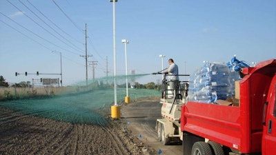 Whether at a shopping center site or public right-of-way, RGMI’s major hydro-seeding and sod-installation capabilities speak to its comprehensive oversight of all landscaping elements of large commercial projects. Land clearing as well as rough and final grading services complement that, as seen here. Photo: Reinhart Grounds Maintenance
