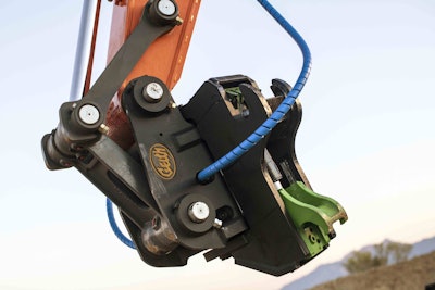 The design enables operators to pick up and change attachments from the cabs of their machines.