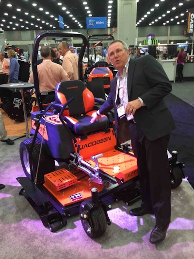 Jacobsen President David Withers talks with reporters at GIE+EXPO this week about the company’s new products, including several UTVs.