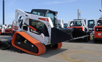 Before loading, make sure the ramp is sufficient for the job. With compact equipment, wooden ramps may splinter. Photo: Bobcat