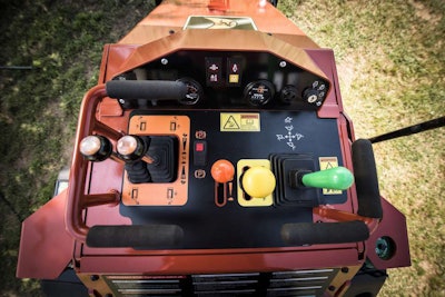 The mini skid steer’s control station is outfitted with standard dual-lever ground drive controls. A joystick is an available option. Photo: Equipment World