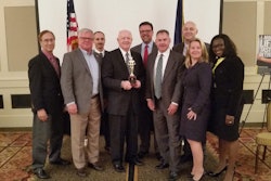 Stihl colleagues and members of the Virginia Manufacturers Association pose with Whyte following the award presentation.