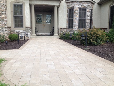 Concrete pavers come in a wide variety of colors. This walkway features Hera pavers from Techo-Bloc. Photo: Hursh’s Landscaping