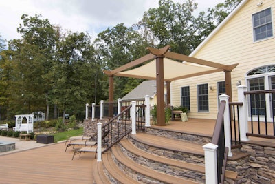 This Trex Pergola “Vision” model uses a tensioned canopy to provide shade, but retractable canopies also are also available. Photo: Trex Co.