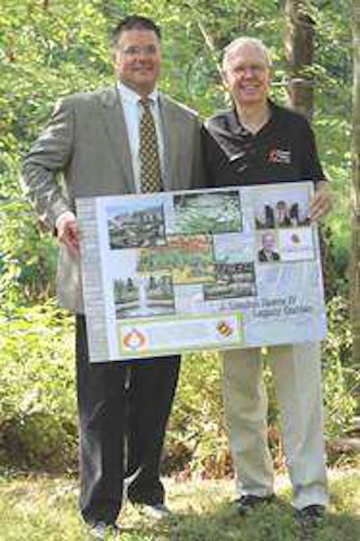 Chapel Valley Landscape founder J. Landon Reeve IV poses with his son, James, who has served as president of the company since 2003.