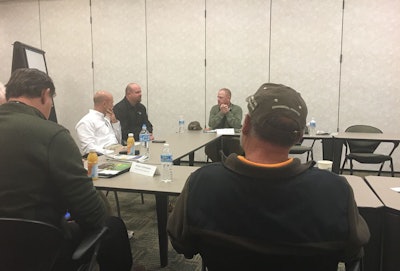 Dividing into small groups focusing on business development, financing and the like, landscape contractors were encouraged to share their experiences during the second day of the visit. Photo: John Deere