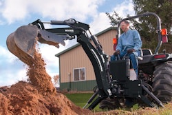 The curved boom of the BH65 “Groundbreaker” backhoe improves visibility for the operator, the manufacturer says. Photo: Woods