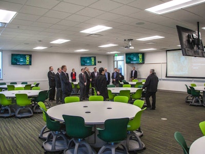Bobcat and Doosan executives tour the new STEM Classroom and Lab Building on the campus of North Dakota State University. Photo: Bobcat Co.