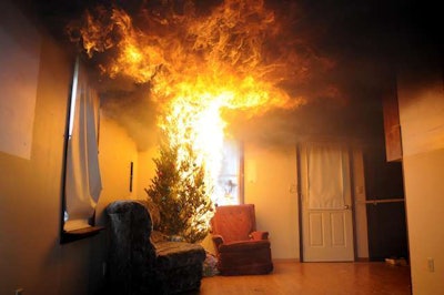 Live Christmas trees that are dried out pose a fire hazard. Always keep live trees well-hydrated. Photo: atlanticalarmnj.com