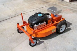 The Evatech MAGA robot is the part of this setup that has the larger wheels and silver device on top. Here, it’s connected to the mower attachment. Photo: Evatech