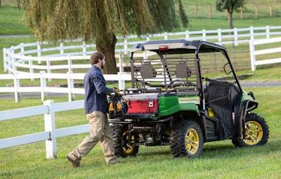 The XUV590i has a 10.5-inch minimum ground clearance, 800-pound load capacity and 1,100-pound towing capacity. Photo: John Deere