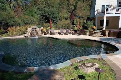Hardscaping and plantings complement, rather than overwhelm, a water feature in this design. Photo: Patty Pohuski