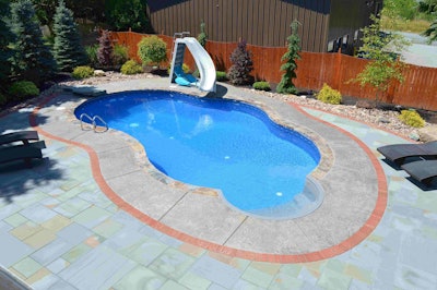 Again, the attractive hardscape work is complemented by attractive and diverse plantings on the periphery.