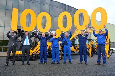 Celebrating the production milestone at JCB’s Savannah, Georgia, operation are, from left: Buta Atwal, managing director of compact products; Ian Gillott, general manager of compact products; Paul Mellor, assembly technician; Dave Thacker, paint sprayer; Mark Bentley, maintenance fitter; Gary Ratcliffe, fitter; and welder Melvin Sims. Photo: JCB