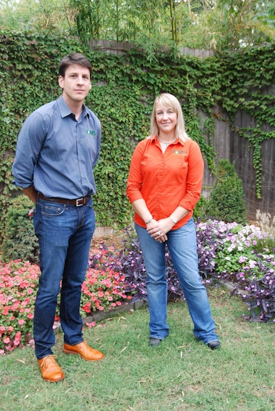 Tom Butchko talks with the company’s lead designer, Cherlyn Reeves, who joined Tom’s Outdoor Living in 2014. Photo: Lauren Heartsill Dowdle