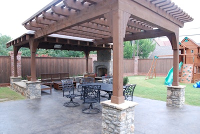 Major projects such as this outdoor living area can develop from client relationships that began with simple lawn-care jobs, Butchko says. Photo: Lauren Heartsill Dowdle