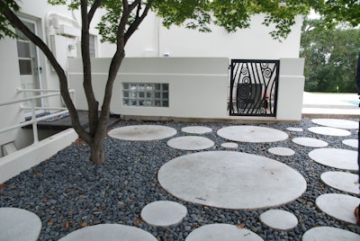 It’s not unusual to come across the Art Deco style among homes and businesses in Tulsa. Butchko’s company takes care to ensure its landscape designs complement their respective sites’ architecture. Photo: Lauren Heartsill Dowdle