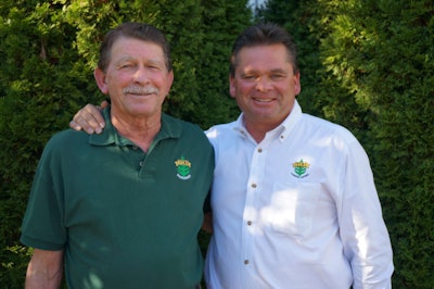 Richard Irvin, left, poses with his son Russell, who is working to ensure TDH Landscaping is around for another 50 years. Photo: Patty Pohuski