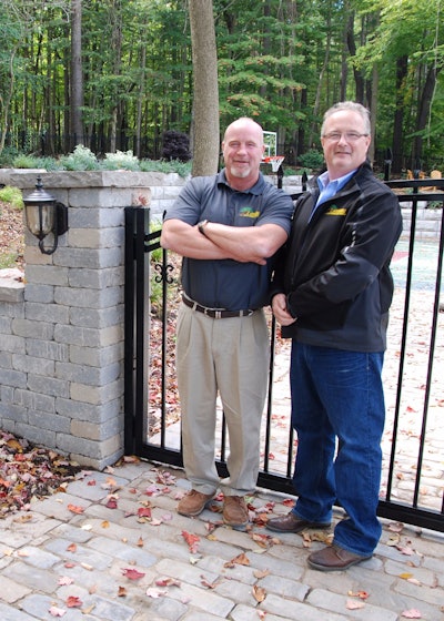 Landscaper of the Year finalist Tim O’Donnell, left, owner of T. O’Donnell Landscaping, poses with his brother Thom, who now how helps manage the business.