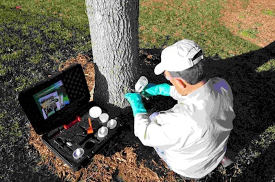 The company’s injection system helps ensure the insecticide will be distributed throughout the tree’s vascular system. Photo: ArborSystems