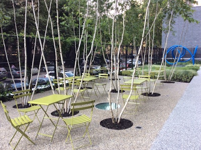 Landscape designers created a courtyard area for residents of the urban apartment building. Photo: Blondie’s Treehouse Inc.