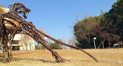 The leaking pipe was found near the “Prey vs. Predator” iron artwork outside Walter Stiern Library.