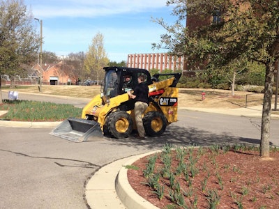 Students receive operation instruction for Caterpillar’s 262D skid steer. Photo: Jill Odom