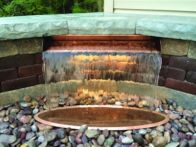 The company’s lighting accessories can be installed inside the splash ring to illuminate the falling water from below. Photo: Atlantic Water Gardens