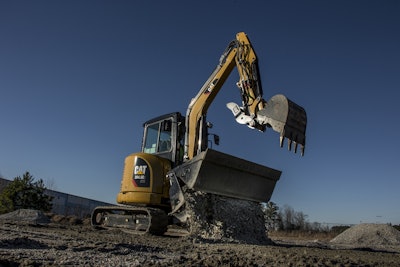 Aside from the skid steer interface, the Xtra Tool Carrier model is a standard 304.5E2 excavator. Photo: Caterpillar