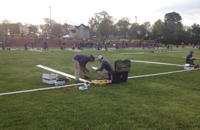Irrigation teams work as quickly as possible Friday morning to complete their systems according to the required specifications. Photo: Jill Odom