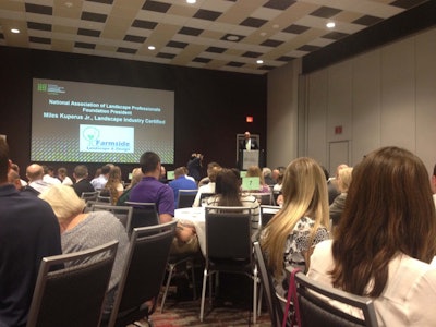 Miles Kuperus Jr., president of the National Association of Landscape Professionals Foundation, welcomes scholarship recipients and industry leaders to the awards ceremony. Photo: Jill Odom