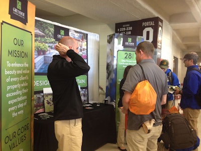 Students talk with representatives of Miamisburg, Ohio-based Grunder Landscaping Co. at Thursday’s National Collegiate Landscape Competition Career Fair. Photo: Jill Odom