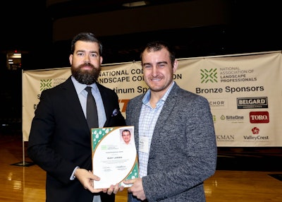 Rudy Larson accepted his award at the National Collegiate Landscape Competition, which was also his first time to visit the event. Photo: NALP