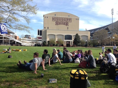 Students listen to instructor Rip Tompkins talk about the best practices of arboriculture. Photo: Jill Odom