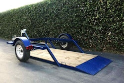 The trailer deck remains flat while it is raised or lowered with the hand-cranked winch. Photo: Airtow Trailers