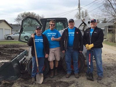 Volunteers used a Bobcat skid-steer loader to help with a variety of landscaping projects at Red River Human Services in Wahpeton, North Dakota. Photo: Bobcat