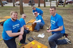 During the first “Doosan Days of Community Service,” employee volunteers renovated a playground at the North Dakota Autism Center in Fargo. Photo: Bobcat