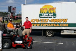 Kevin Kirby of Top Cut Lawn and Landscaping, sits atop his new Toro Z Master Professional Series Z. On hand to congratulate him are, from left, Gene Mobley of Toro distributor Jerry Pate Co. and Jon Richardson of Toro. Photo: Toro