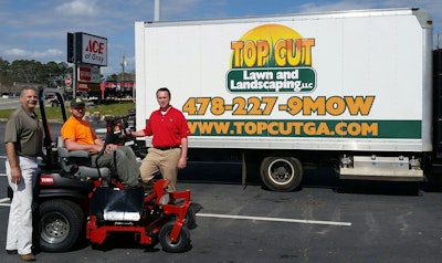 Kevin Kirby of Top Cut Lawn and Landscaping, sits atop his new Toro Z Master Professional Series Z. On hand to congratulate him are, from left, Gene Mobley of Toro distributor Jerry Pate Co. and Jon Richardson of Toro. Photo: Toro