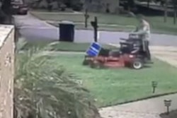 A screenshot of the video showing the landscaper mow down the Trump campaign sign. Photo: News 6