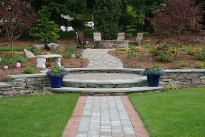 Straight paths direct the traveler to their immediate destination, which in this case is a patio. Photo: Creative Garden Designs